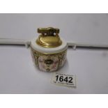 A Royal Crown Derby table lighter.