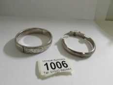 2 hall marked silver bangles.