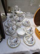 An Aynsley coffee set and a Royal Worcester coffee set.