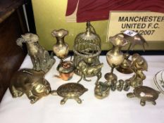 A mixed lot of brass ornaments.