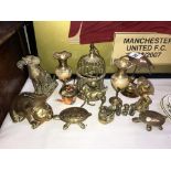 A mixed lot of brass ornaments.