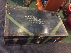 A Vintage Military trunk being the property of D Carter of Stratford and Calcutta bearing a label