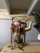 A brass and copper arts and crafts kettle on stand by Bing of Germany,