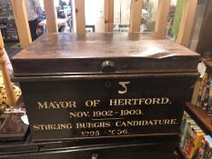 An interesting early 20th black painted tin deed box / small trunk,