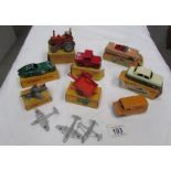 A quantity of boxed and unboxed Dinky toys including aeroplanes.