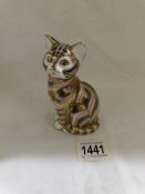 A Royal Crown Derby cat paperweight.