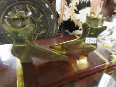 A pair of trench art brass boot spill vases.