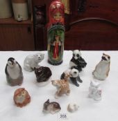 6 Russian animal figures, a Russian doll and 5 cat figures.