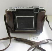 A Zeiss Ikon Super Ikonta 532/16 camera with original case.