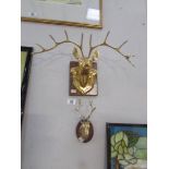 2 wall mounted brass stags.