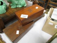 2 small wooden boxes.