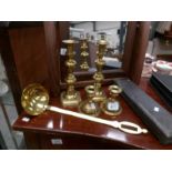 A pair of Victorian brass candlesticks, a pair of squat brass candlesticks,