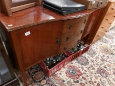 A mahogany bow fronted sideboard.