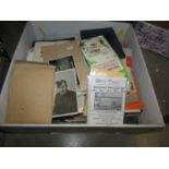 A box containing a large amount of mixed ephemera including postcards of military and civil