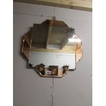 A fabulous art deco wall mirror with amber glass panels.