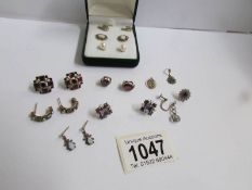 8 pairs of earrings and 4 odds (some missing backs).