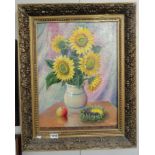 A 20th century oil on canvas still life featuring sunflowers with Russian detail to frame and