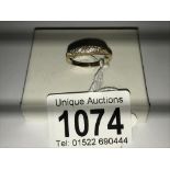 An 18ct gold ring set diamonds, size S.