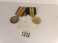 A pair of British war and victory medals for H Nichol, RN.