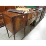 A mahogany sideboard.