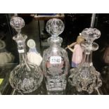 3 glass decanters.