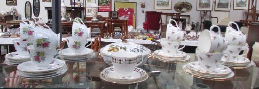 A mixed lot of china tea cups and saucers together with a Royal Worcester Evesham pattern tureen,