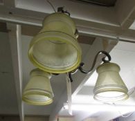 A retro ceiling light with shades.