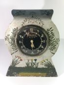 A Kraftstuff hand painted metal clock ((Aviation Luftwaffa ME109) bearing the signature to the rear