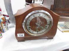 An 8 day mantel clock.