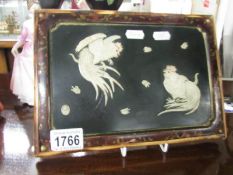 Oriental framed fighting cocks.