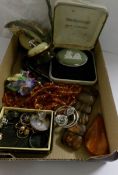 A mixed lot of costume jewellery including 9ct gold watch head.