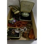 A mixed lot of costume jewellery including 9ct gold watch head.