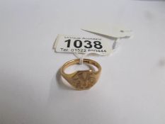 An 18ct gold signet ring, size Q.