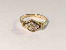 An 18ct gold and diamond ring, size M.