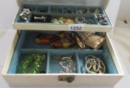 A jewellery box and a mixed lot of jewellery.