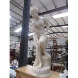 A classical style nude garden statue.