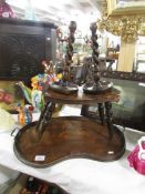 An inlaid tray a/f, a carved wood stool and a pair of wooden candlesticks.