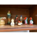 A mixed lot of bird figures including salt and pepper pots.