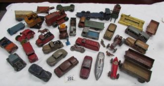 A box of playworn Dinky die cast toys.