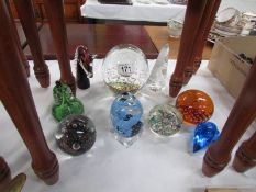 9 good glass paperweights.