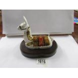 A Royal Crown Derby paperweight, Llama on wooden base.