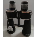 A pair of German binoculars with Nazi Germany Reichsadler eagle emblem.