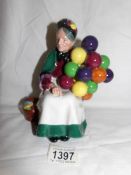 A Royal Doulton figure, The Old Balloon Seller, HN1315.