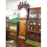 An oak inlaid painted dial 8 day long case clock marked Whitmore & Son, Northampton.