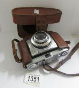 A cased Kodak 'Retinette' camera.