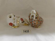 A Royal Crown Derby seal paperweight and a Royal Crown Derby walrus paperweight.