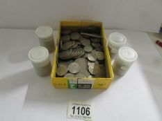 A large quantity of old British nickel coins.