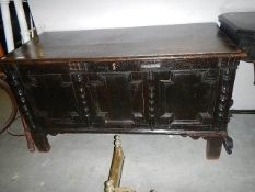 A period oak coffer.