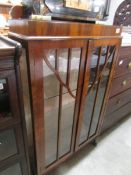 A mid 20th century china cabinet.