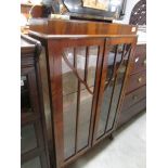 A mid 20th century china cabinet.